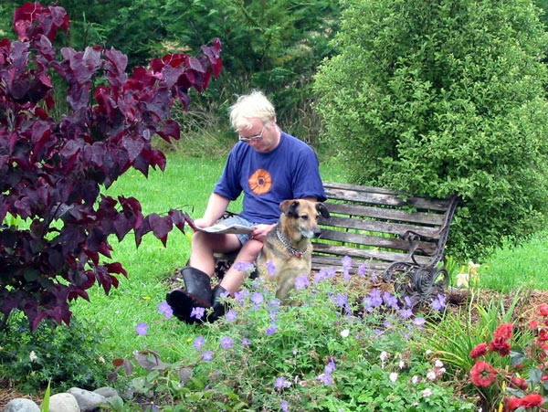  Stephen and Taj-dog sitting and relaxing. 